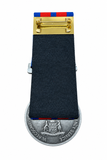 Sharpened medal rear on white background