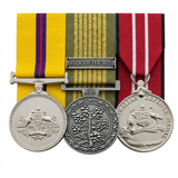 Three-medal set with a clean white background