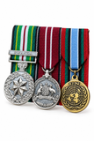 UN Rwanda Medals Angled White BG